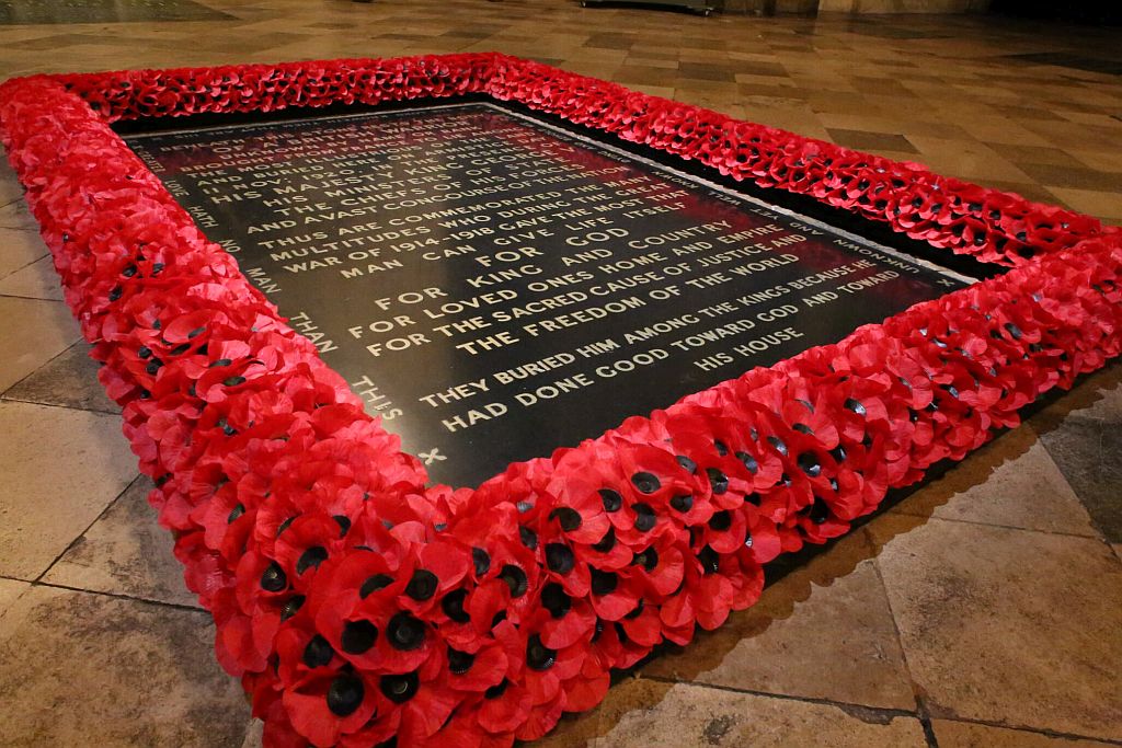 The coffin of the Unknown Warrior in state in Westminster Abbey in